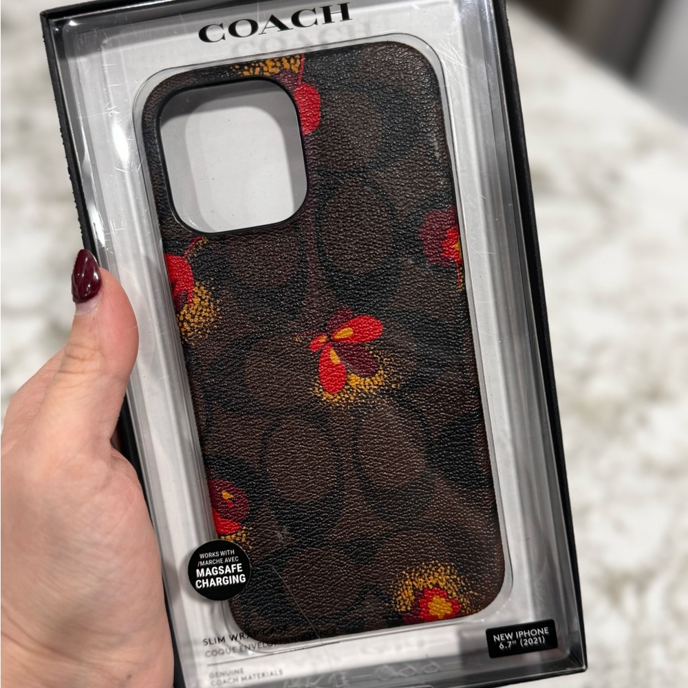 iPhone 12 Pro Max coach case. Used a few times. Like new condition.